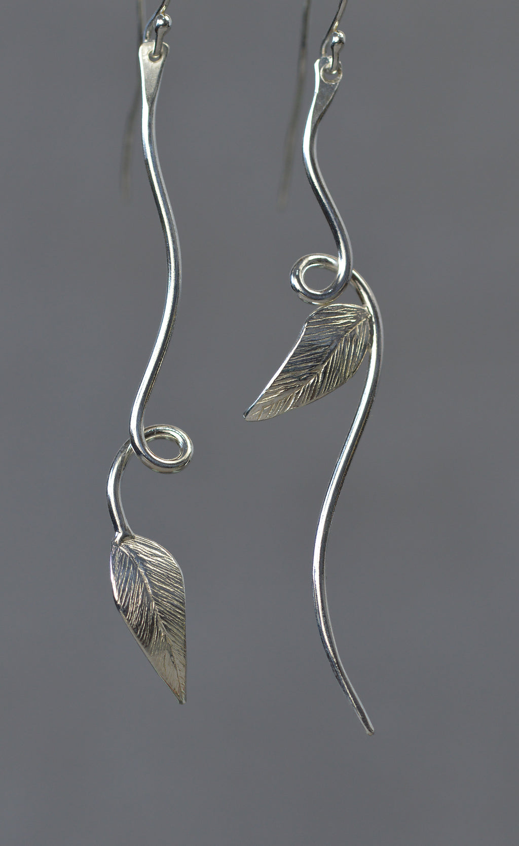 silver asymmetrical leaf earrings