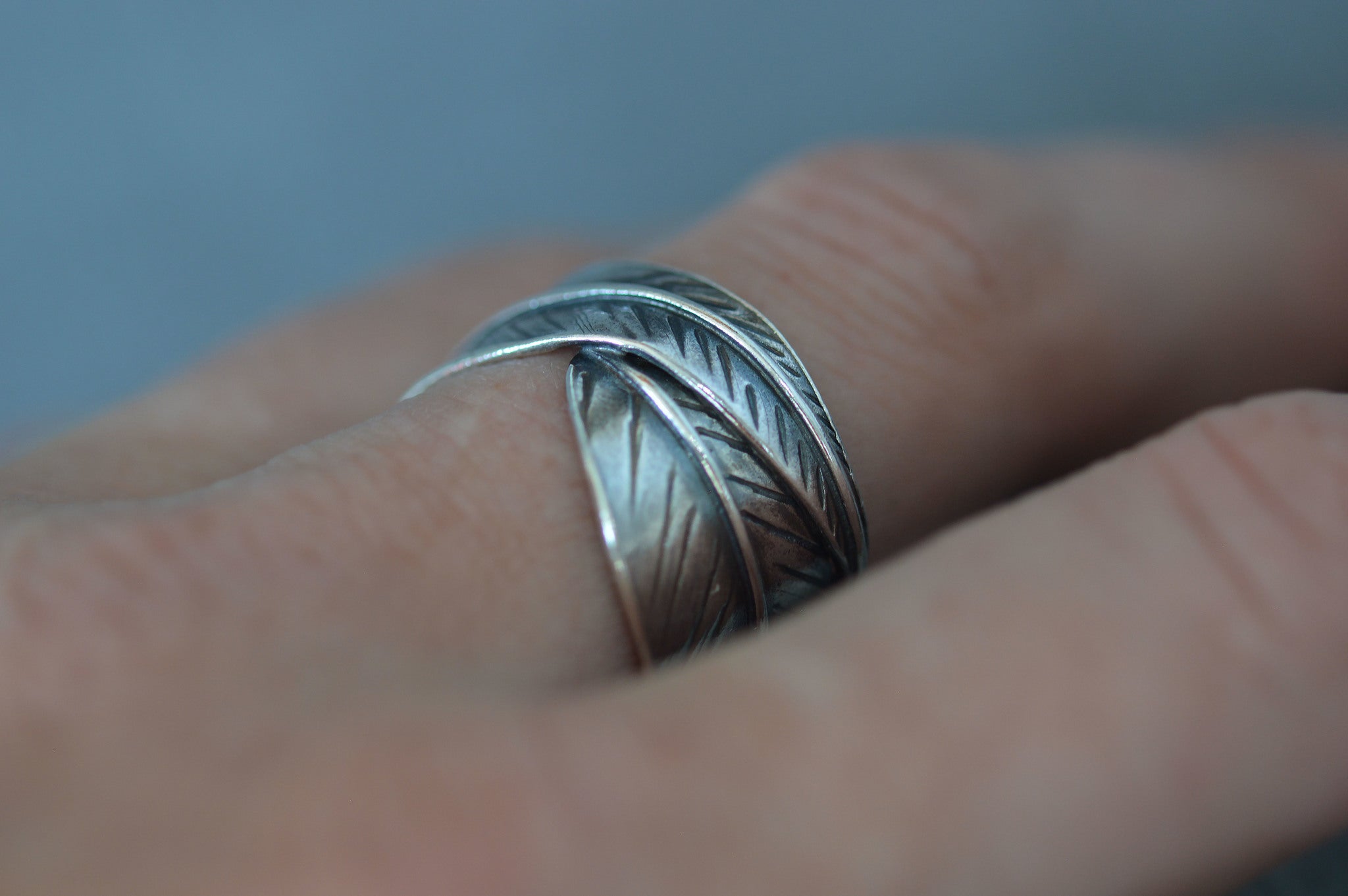 sterling silver leaf ring modelled on womans finger