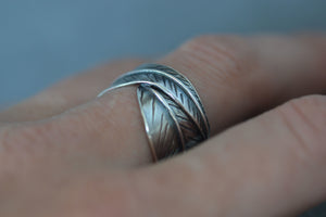 sterling silver leaf ring modelled on womans finger