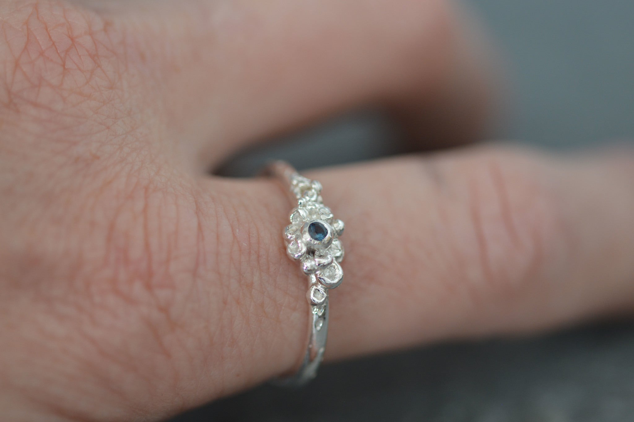 barnacle ocean ring on the finger